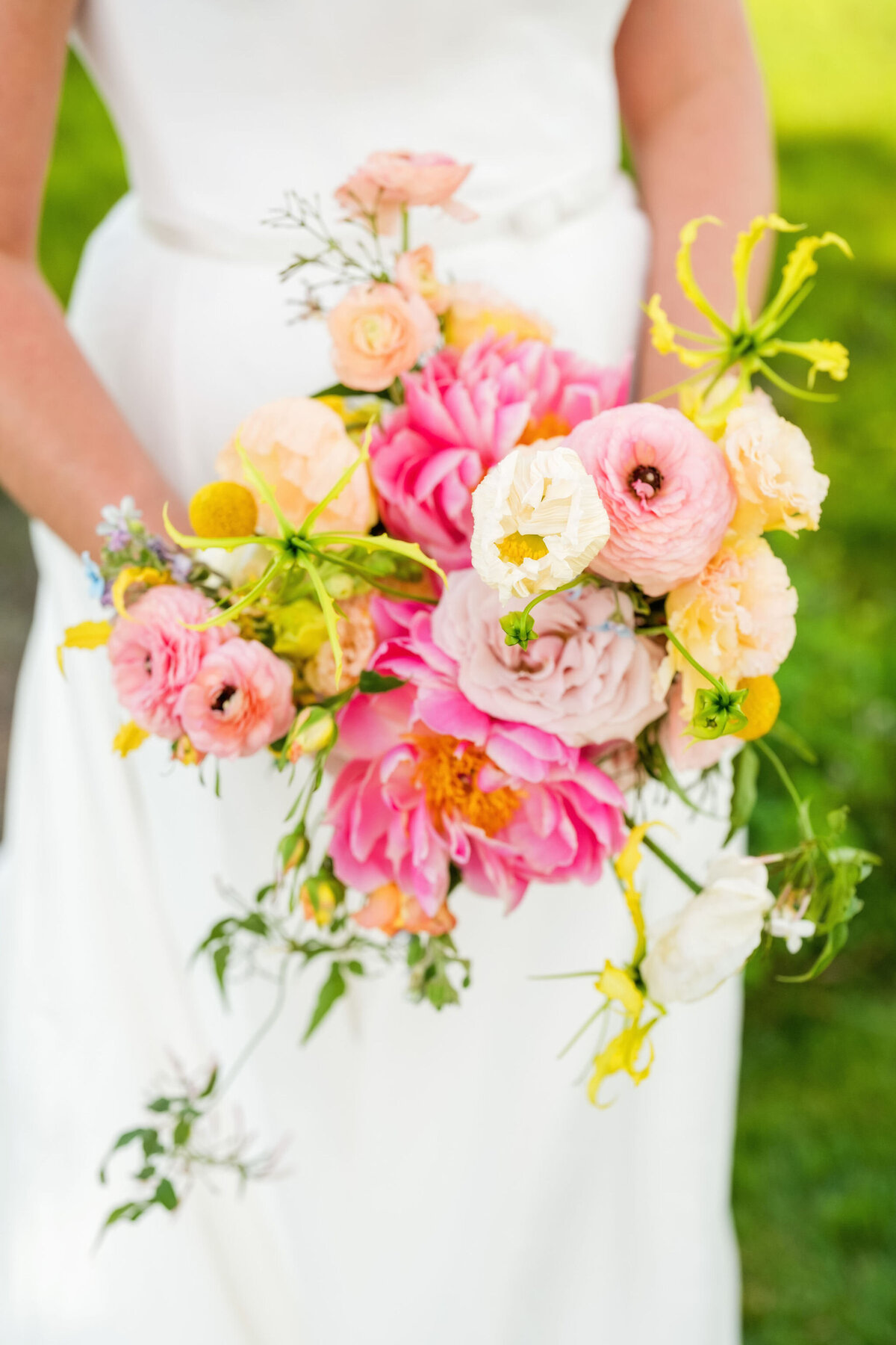 Bride with Colorful Pink and Yellow Bouquet