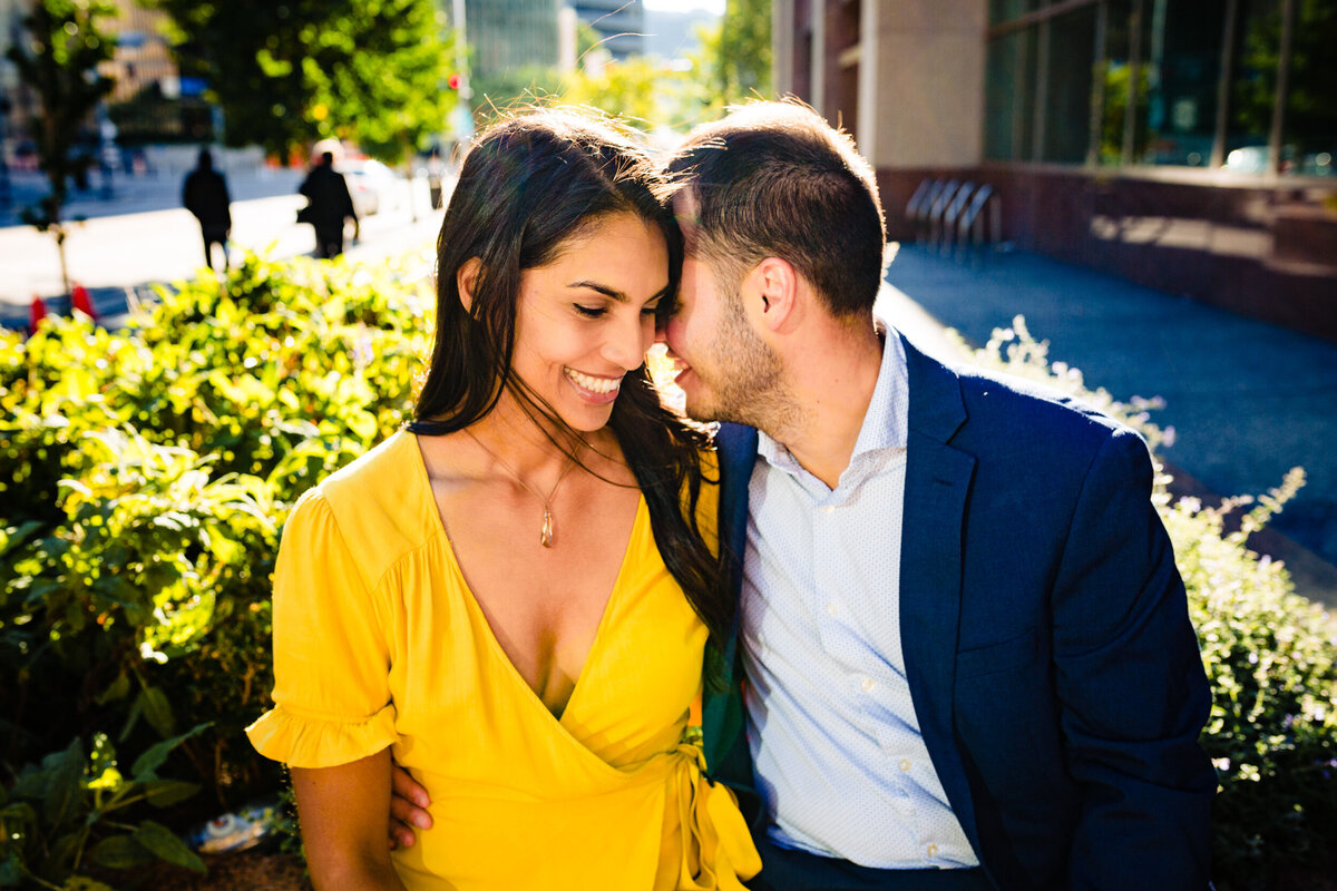 Couple dances in the street of downtown Pittsburgh During their engagement  photos. Photo By Adore Wedding Photography, Wedding Photographers in Toledo Ohio