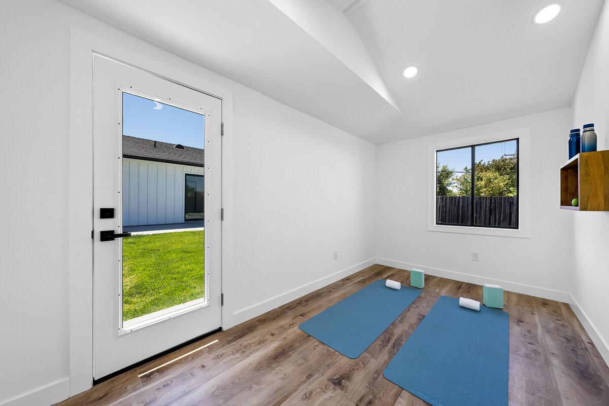 aw-development-adu-yoga-room-natural-light-backyard-access