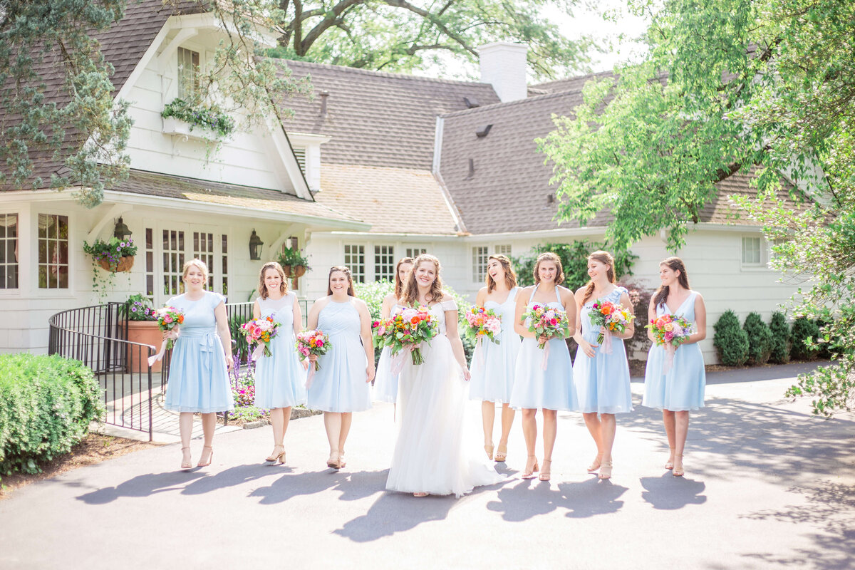 Bride-and-bridesmaids-outside-on-wedding-day-Bethany-Lane-Photography-6