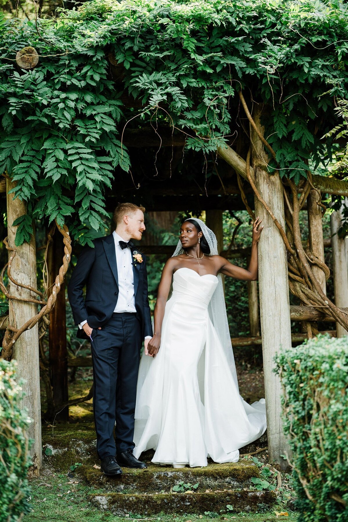 Bride and groom sharing a tender moment at their luxury Carnation Farms wedding in the Pacific Northwest
