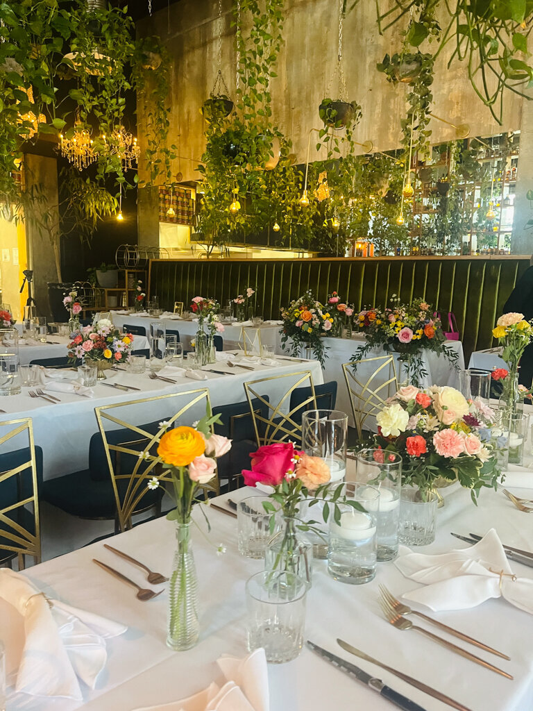 Romantic and feminine wedding ceremony floral decor by Le Bouquet, Calgary wedding florist, featured on the Brontë Bride Vendor Guide.