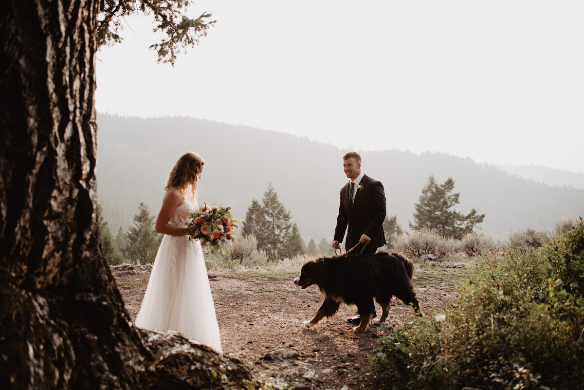 Jackson Hole Photographers capture groom walking dog