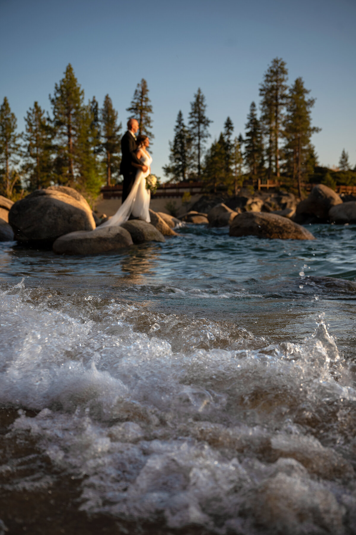 out of focus wedding  couple picture at sand Harbor beach Nevada