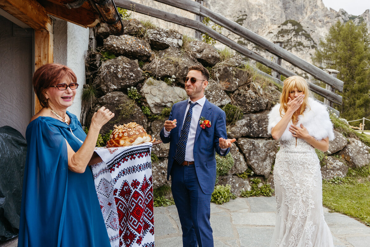Ukrainian Korovai bread tradition during Dolomites wedding