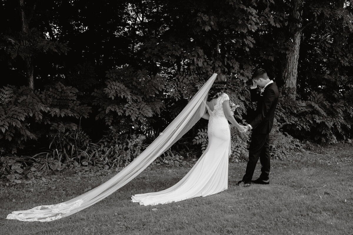 emotional groom sees bride for the first time