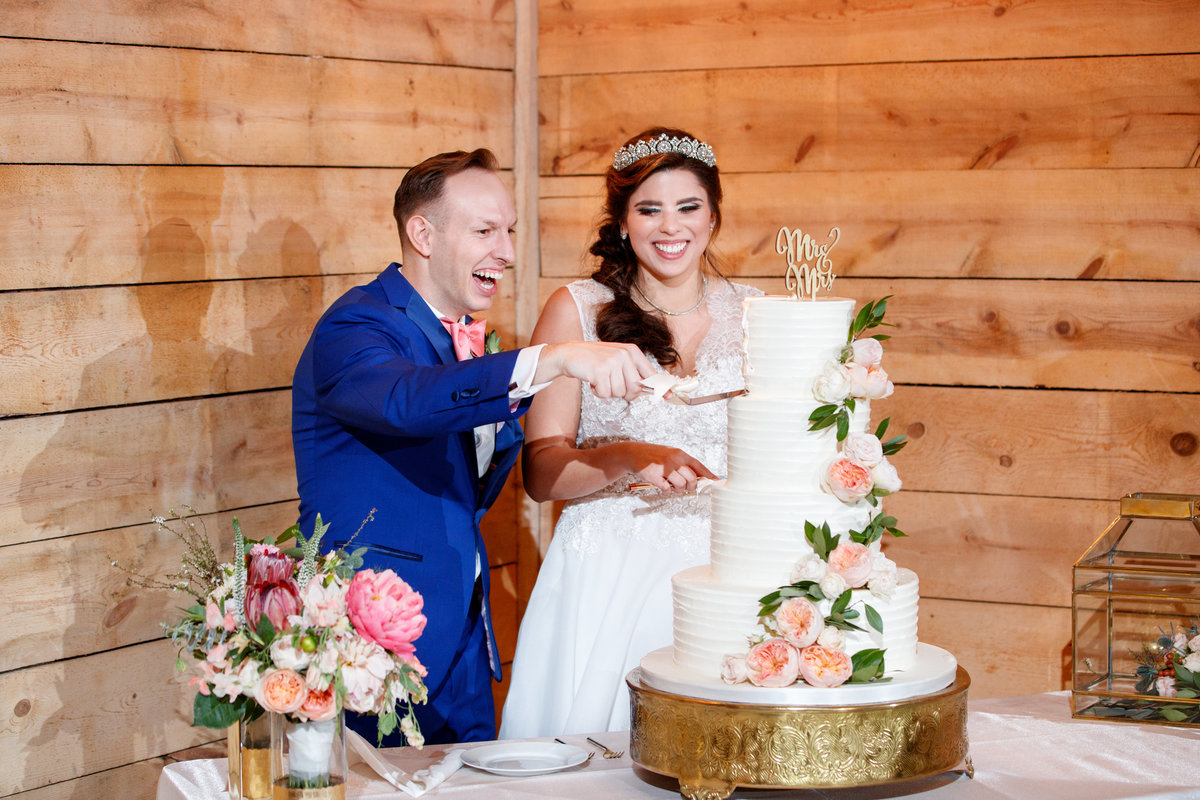 Austin wedding photographer addison grove wedding photographer bride groom cutting cake