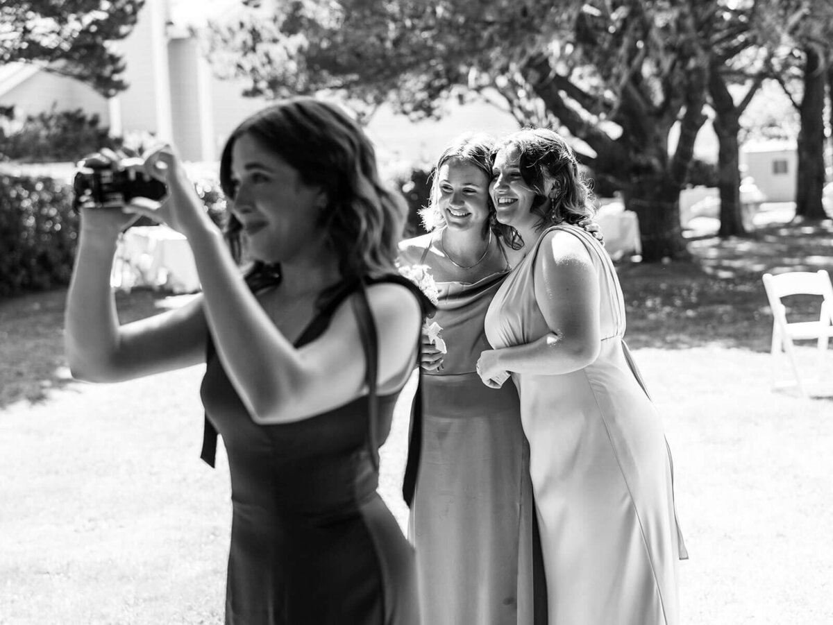 Three women posing for a photo.