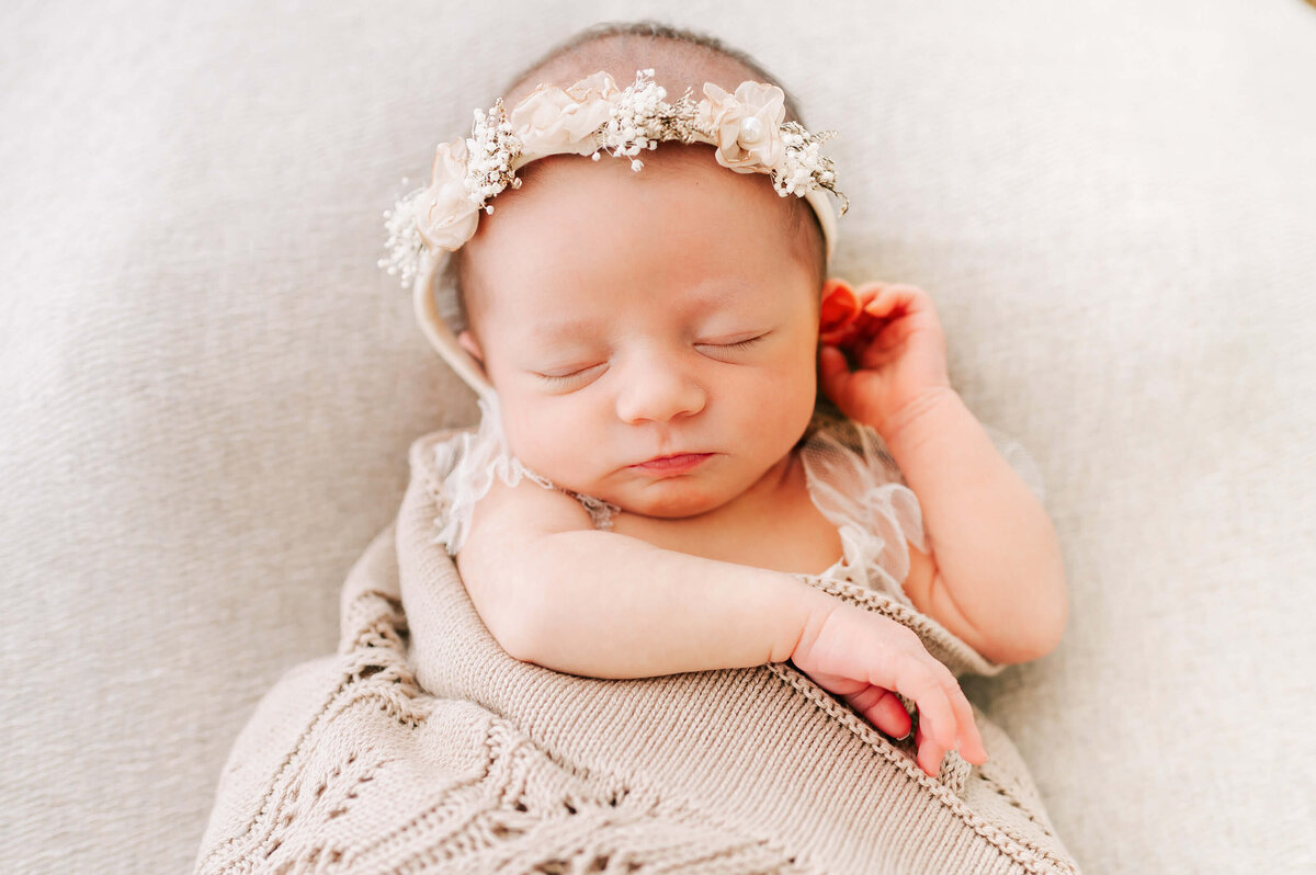 Springfield MO newborn photographer captures sleeping baby girl in floral crown