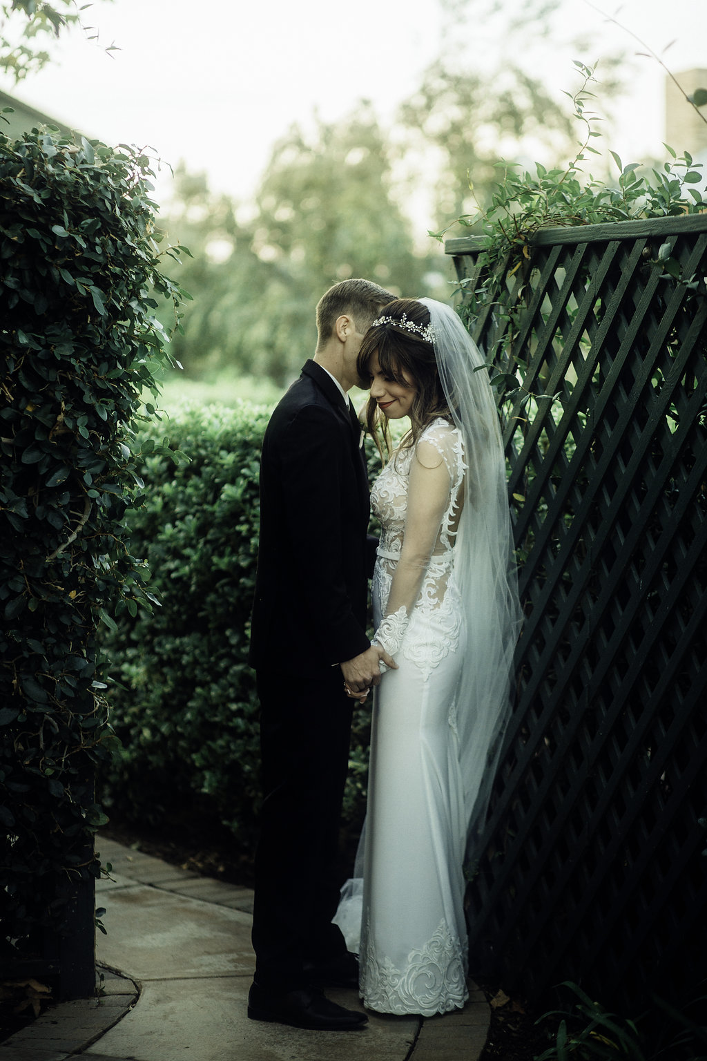 Wedding Photograph Of Groom Whispering To His Bride Los Angeles