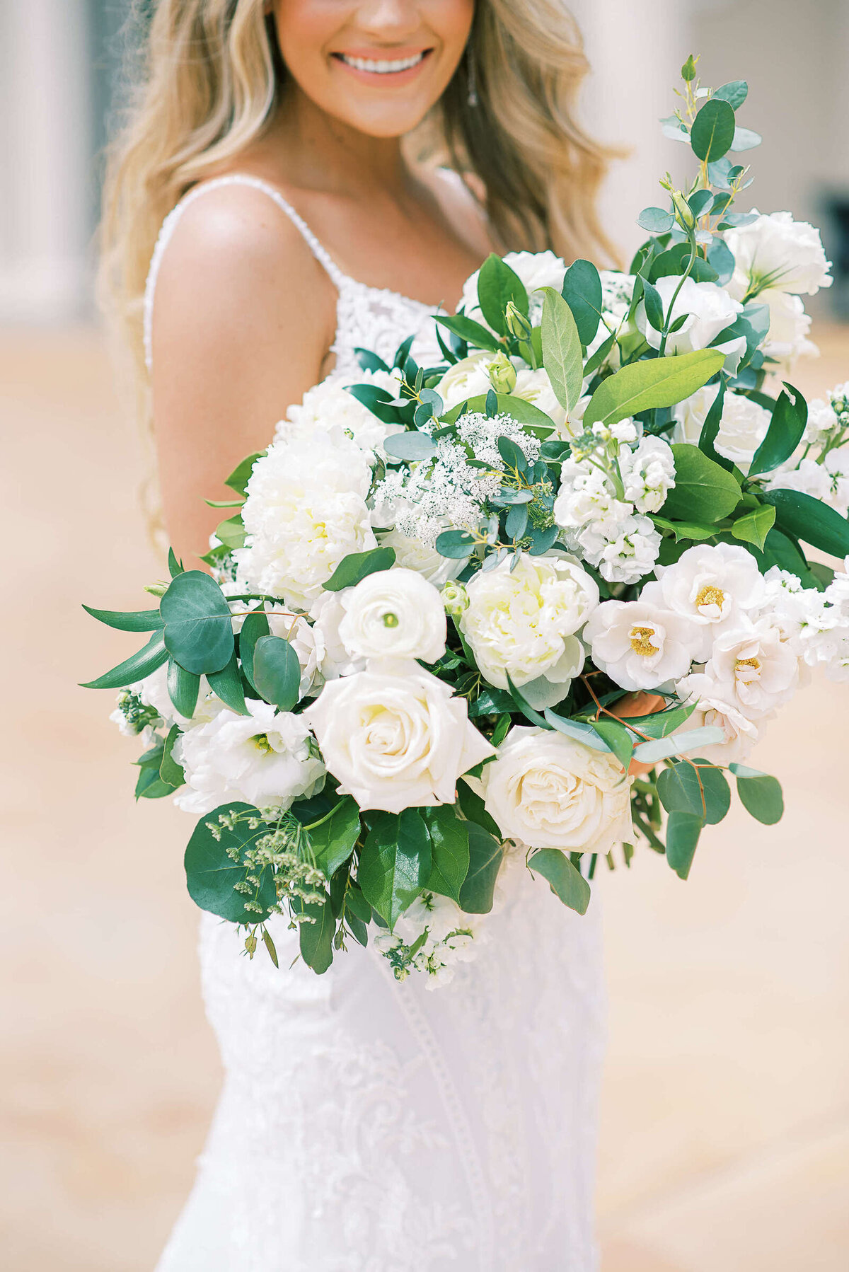 Lush white bridal bouquet at McKinney wedding in D'Vine Grace Vineyard