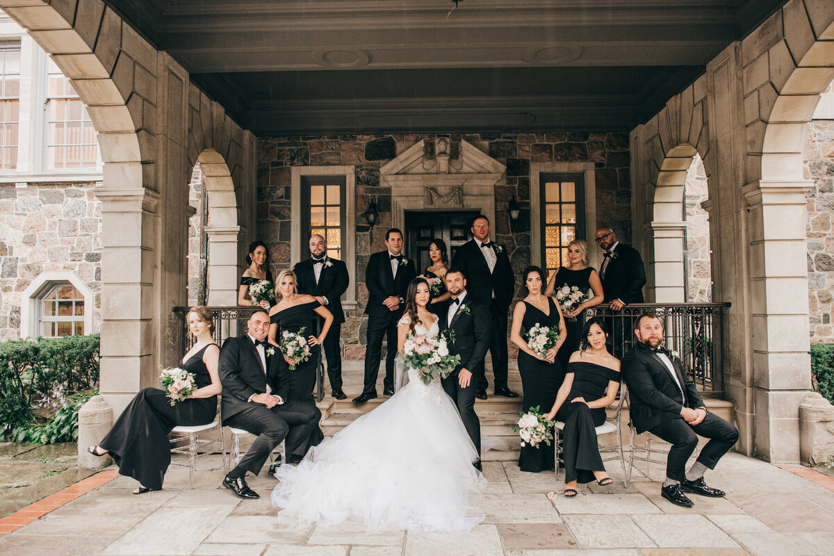 Serious wedding party portraits for luxurious wedding party by Nova Markina Photography