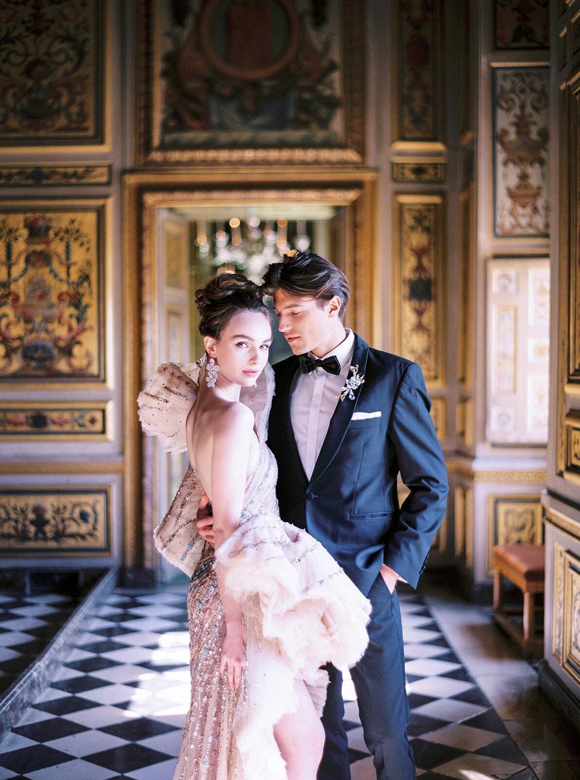 The stunning photo at Chateau Vaux le Vicomte in Paris, France was captured by photographer Audrey FORA, known for her exquisite work in capturing unforgettable moments.