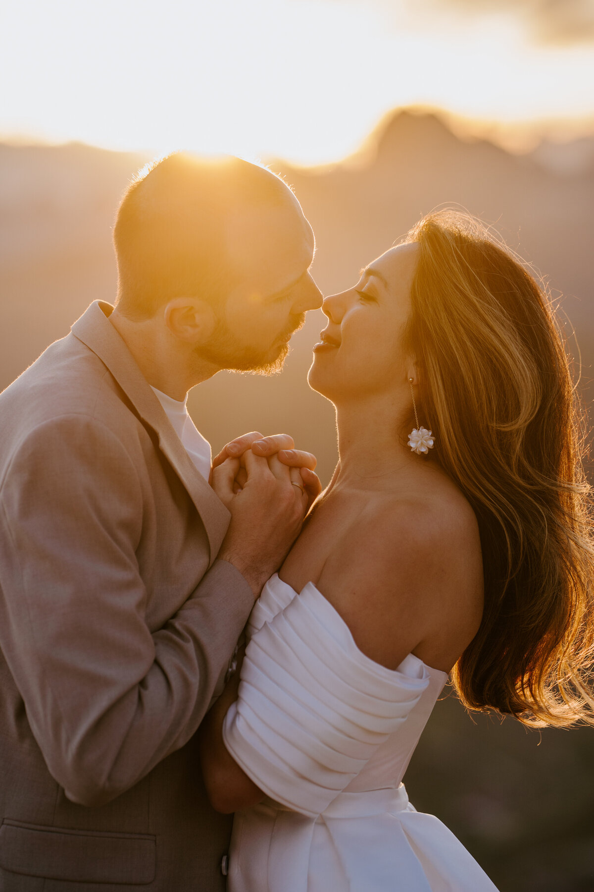 romantic couple close up shot during twilight elopement in Dolomites