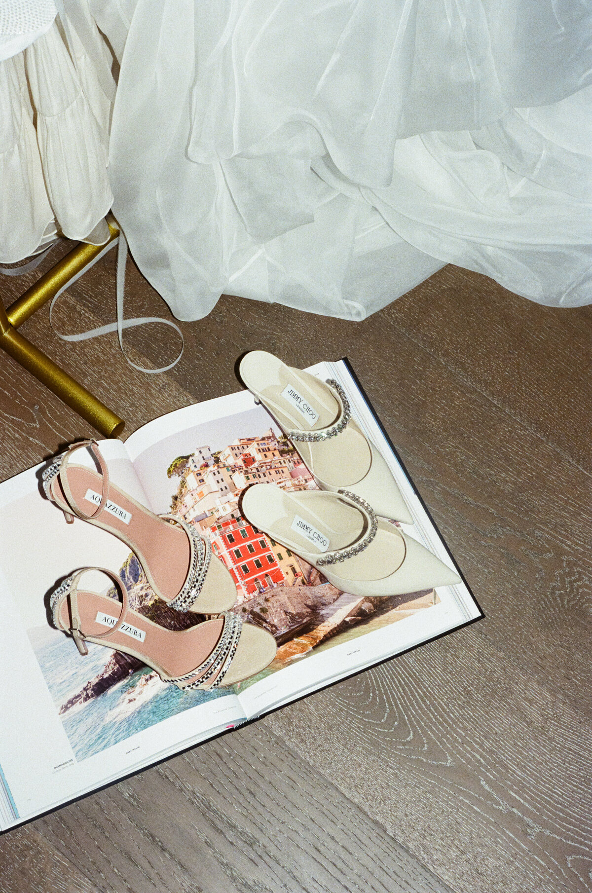  Intimate bridal preparation moments captured in film photography at NOBU Hotel Chicago, featuring fashion forward bride in elegant lingerie with editorial wedding photographer Lauren Alatriste's signature timeless aesthetic approach.