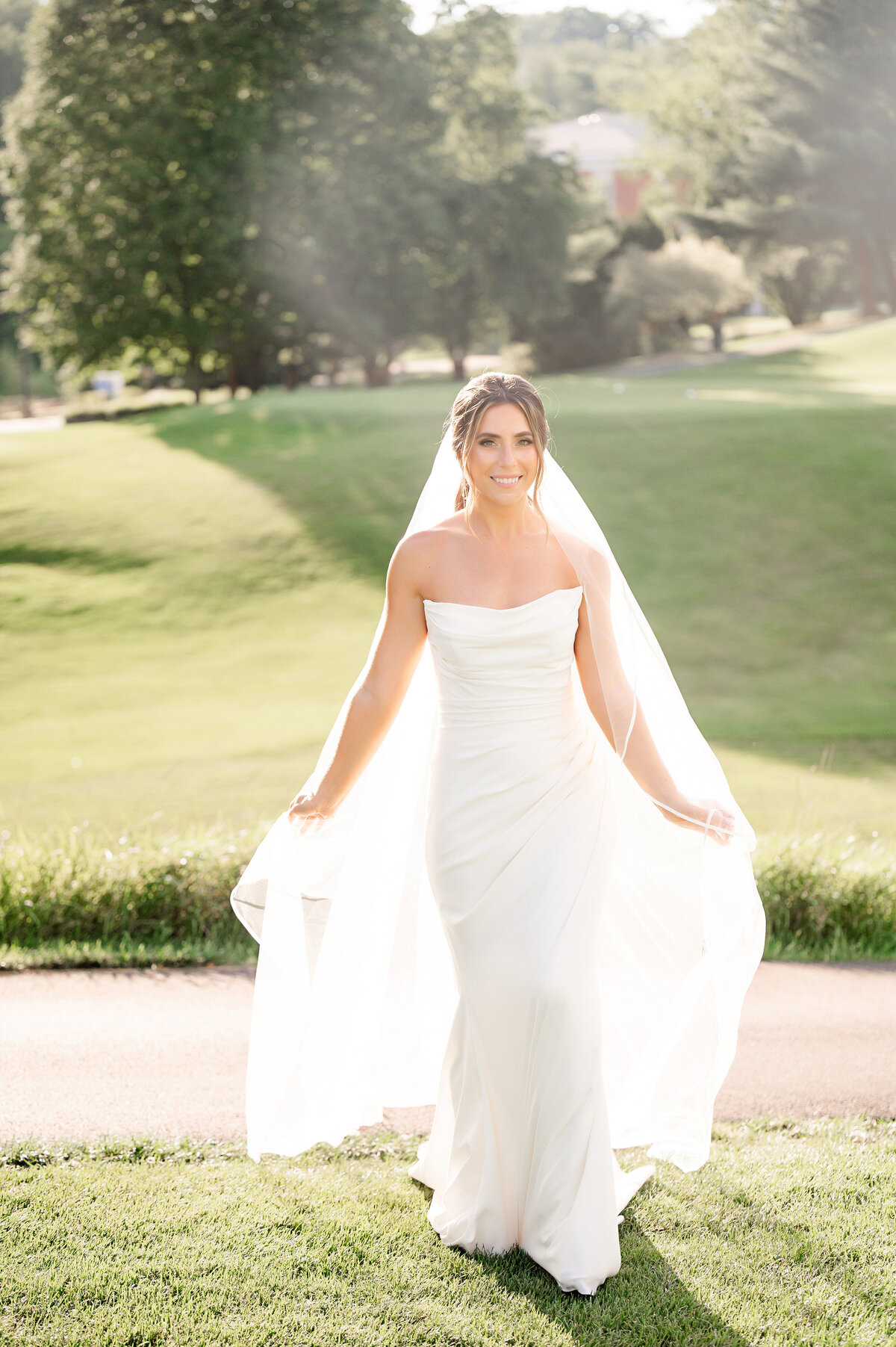 bride in anne gregory for the bride wedding dress