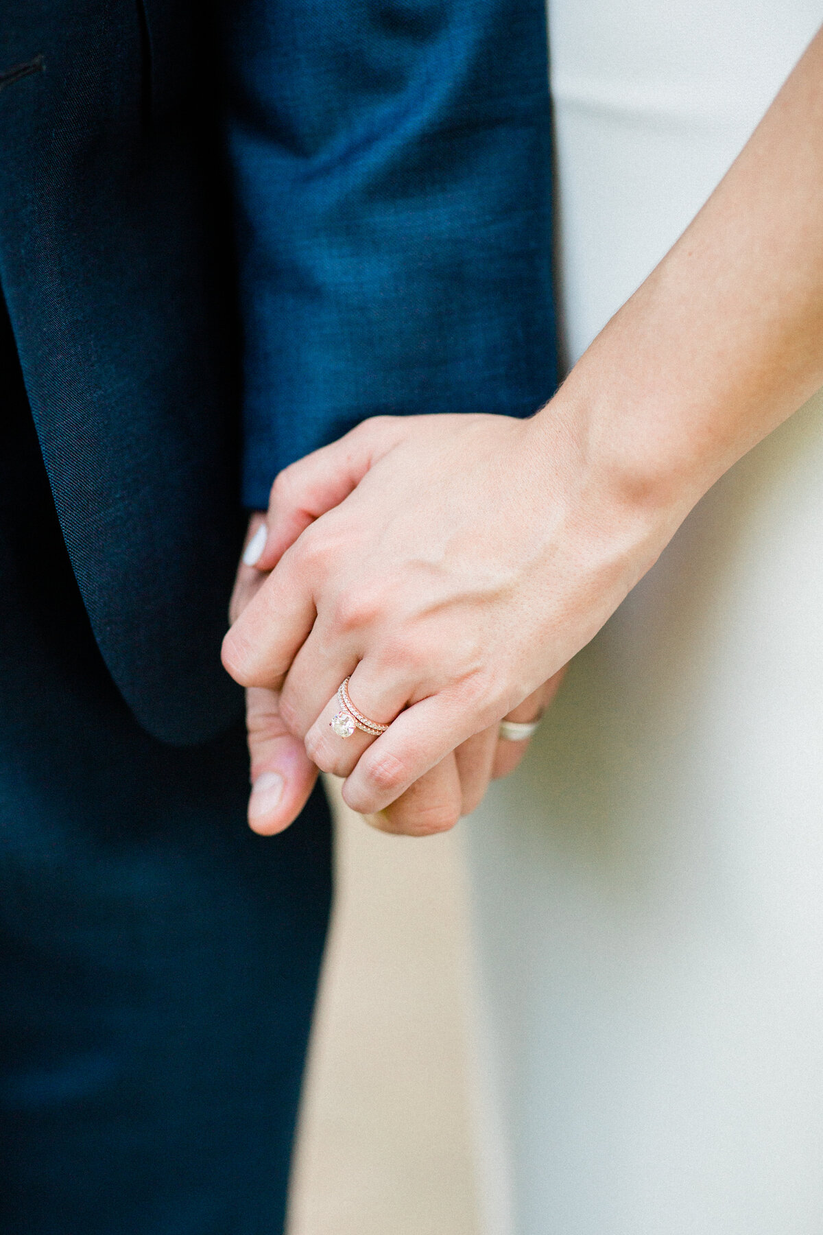 Close Up of Holding Hands and Wedding Rings
