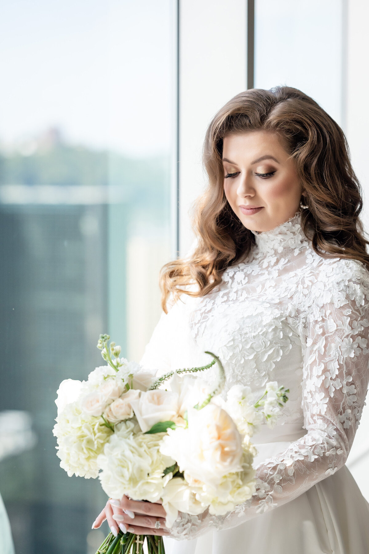 bride in lazaro bridal lace dress pittsburgh