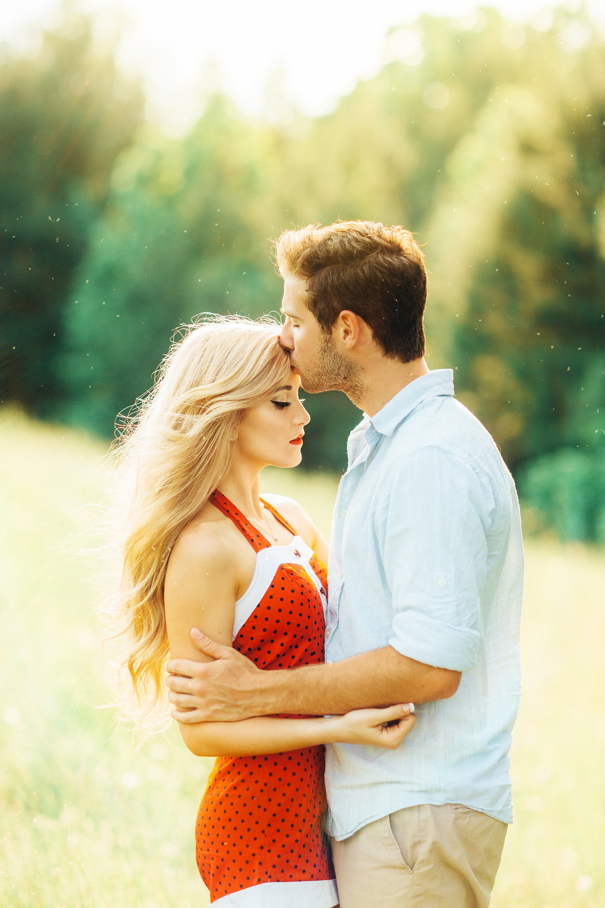 Newly Engaged Couple Kissing Photography