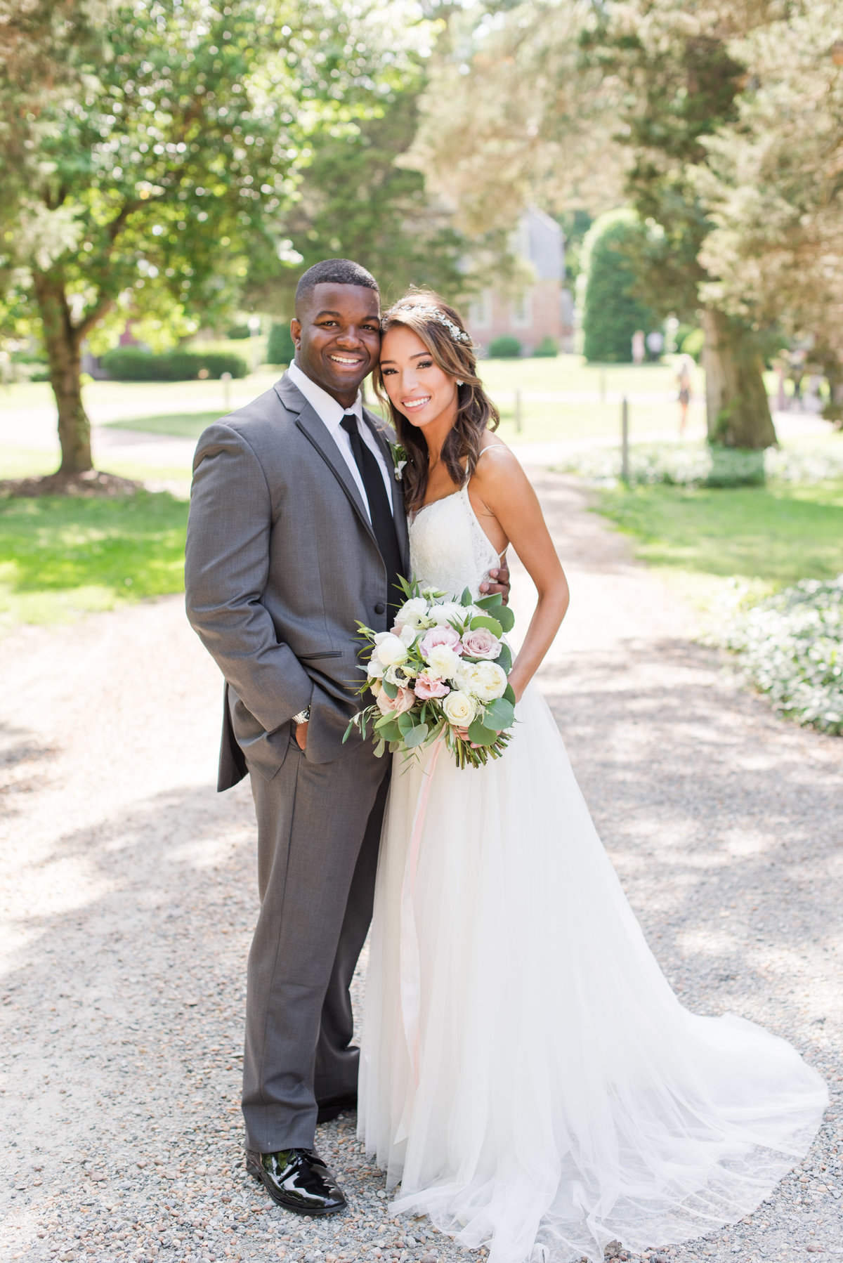 Virginia Bride and groom smiling during historic estate wedding in the spring