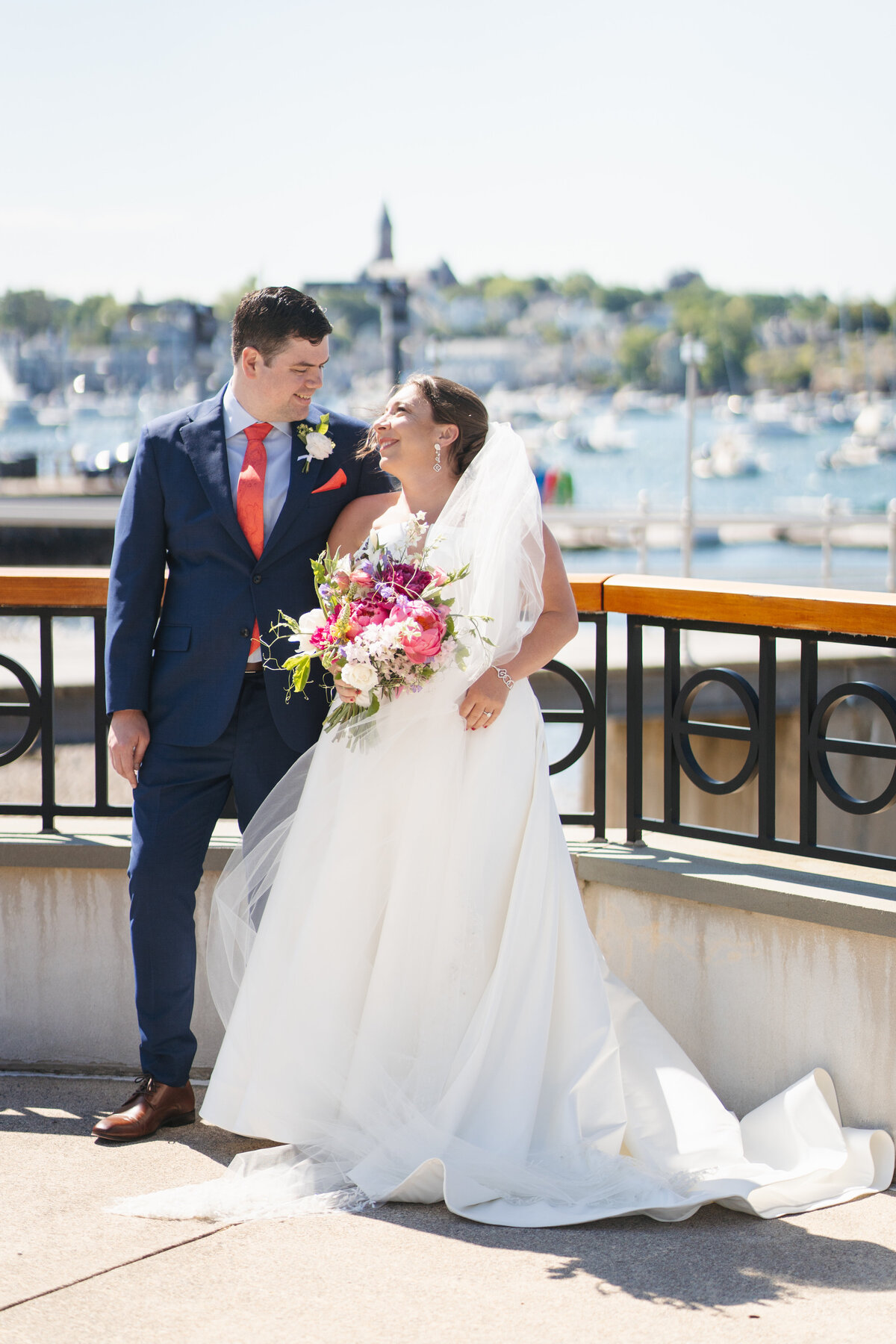 Celebrate your summer wedding at Eastern Yacht Club captured by Danielle Little Photography. Discover breathtaking waterfront views and timeless moments expertly captured, ensuring your special day is preserved with elegance and grace.