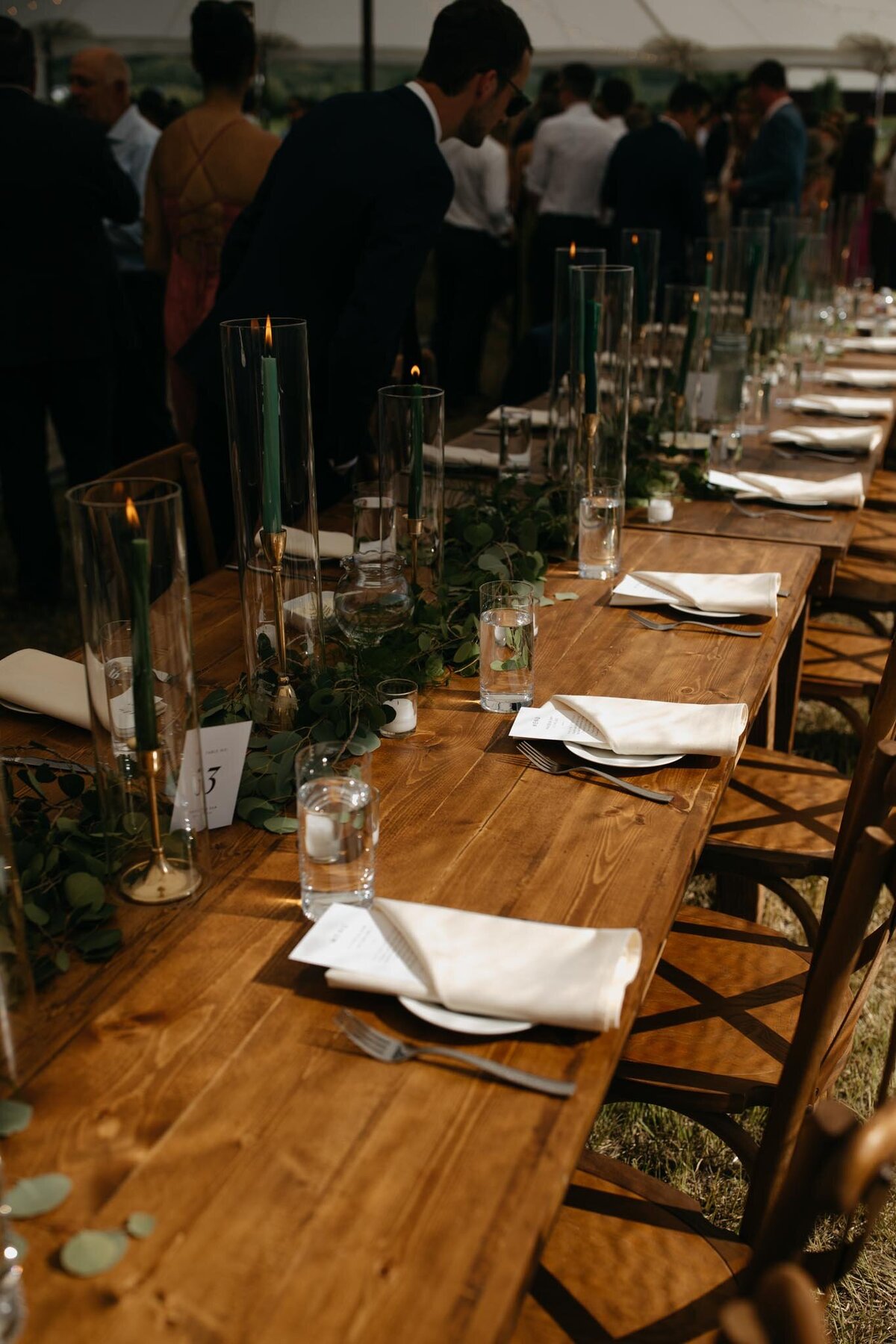 Wood-farm-table-aspen-garland-taper-candles-green