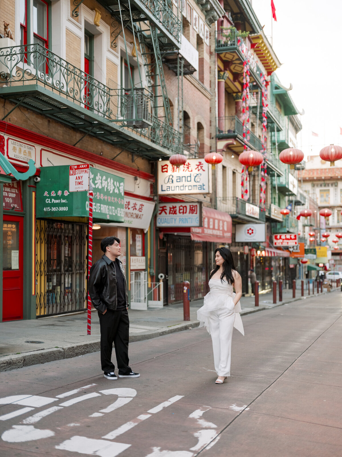Engagement couple walking Chinatown San Francisco street photography session