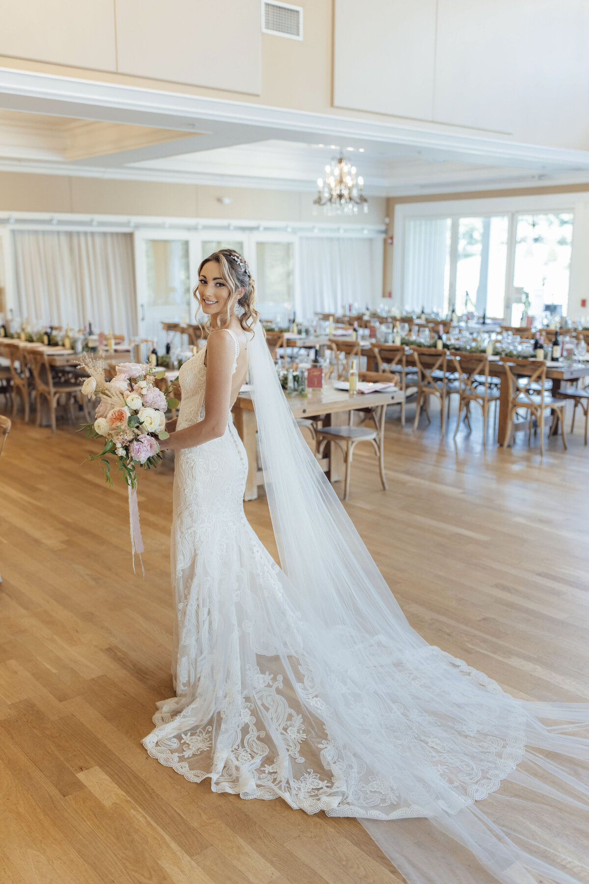 bear-brook-valley-country-club-wedding-photo-bride-posing-veil-flowers-ballroom-annandale-new-jersey