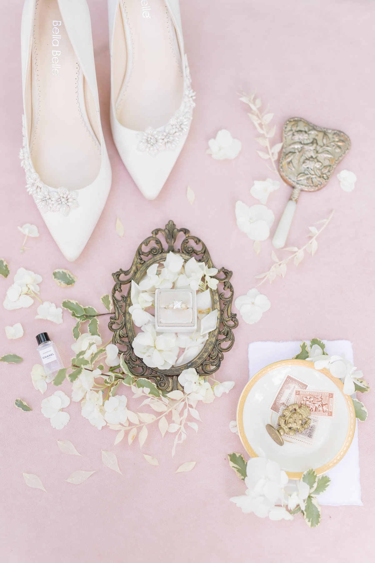 pink background white wedding shoes