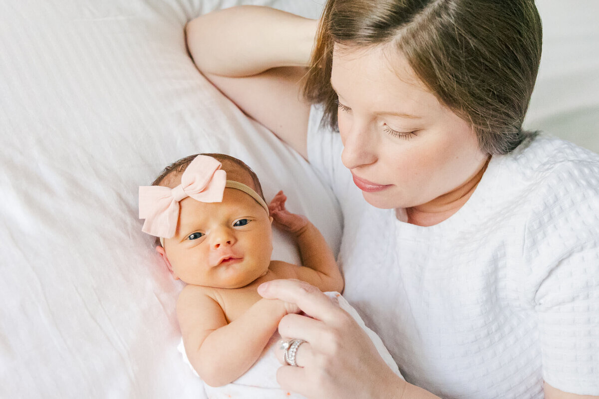 Mom looking down at baby