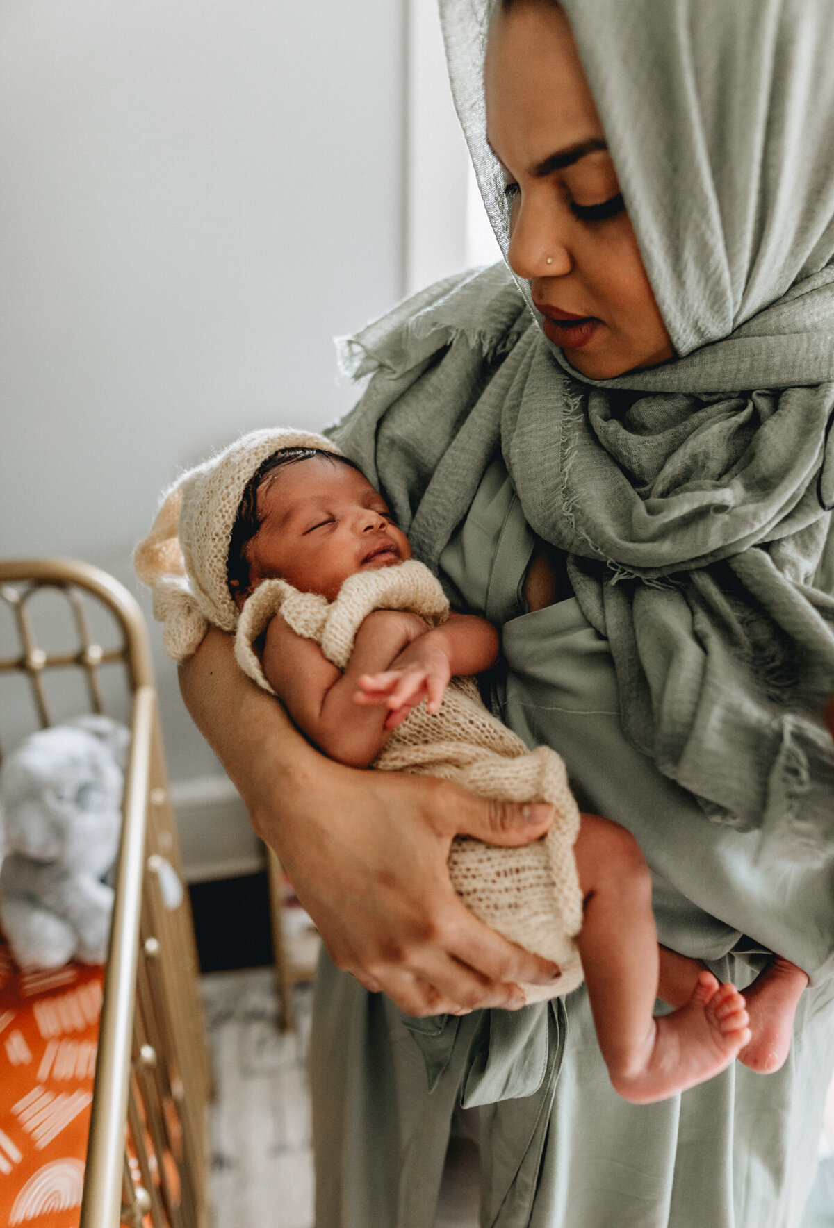 Family Photoshoot Session  with mom holding newborn baby.