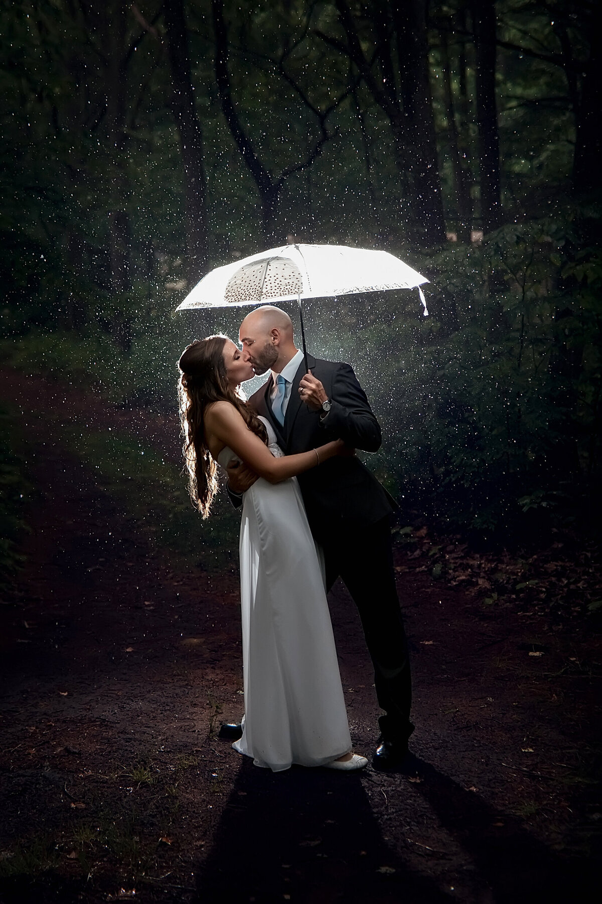 rain wedding backlit