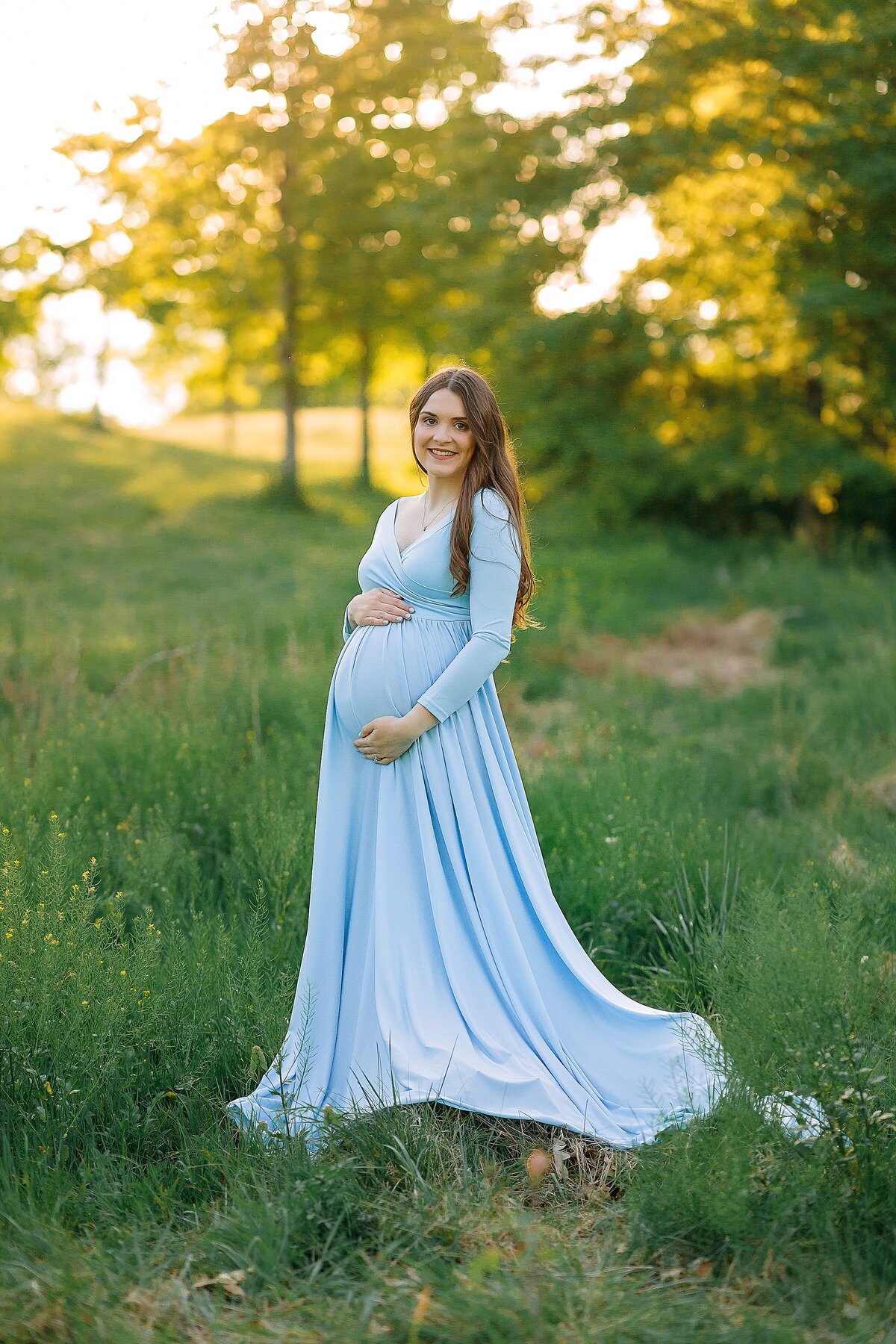 Maternity session in red dress with sunset in Harrisonburg, VA