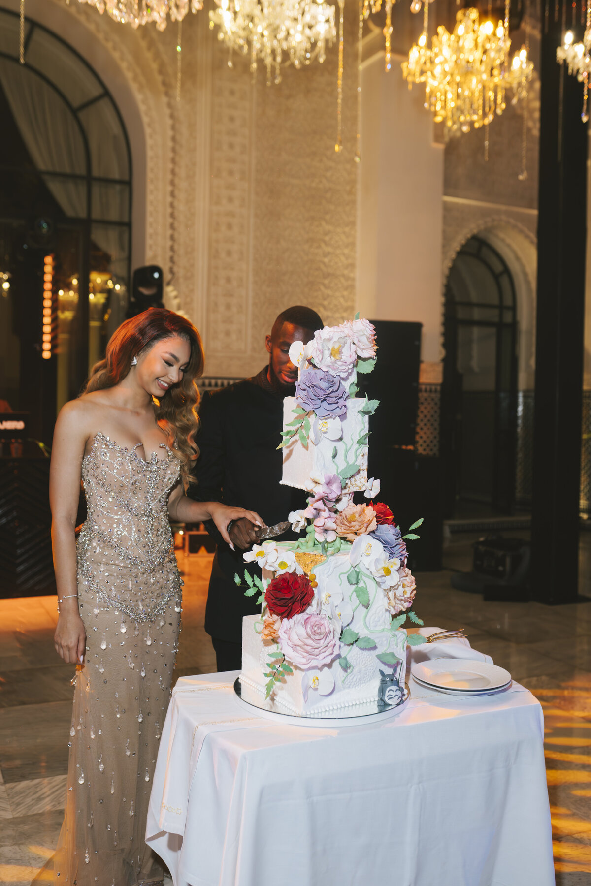 Bride cutting cake