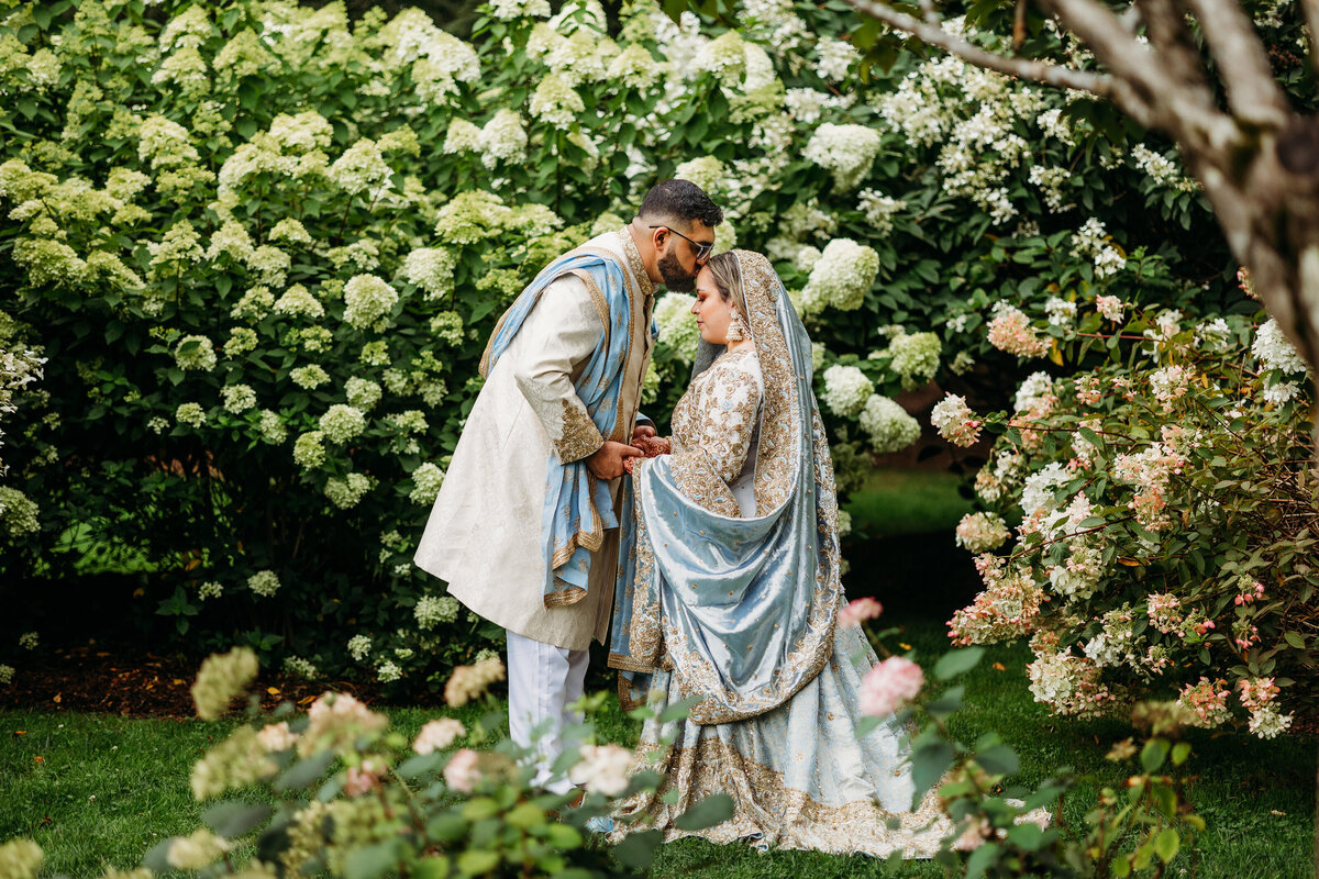 Groom kisses his brides forehead before Nikkah ceremony