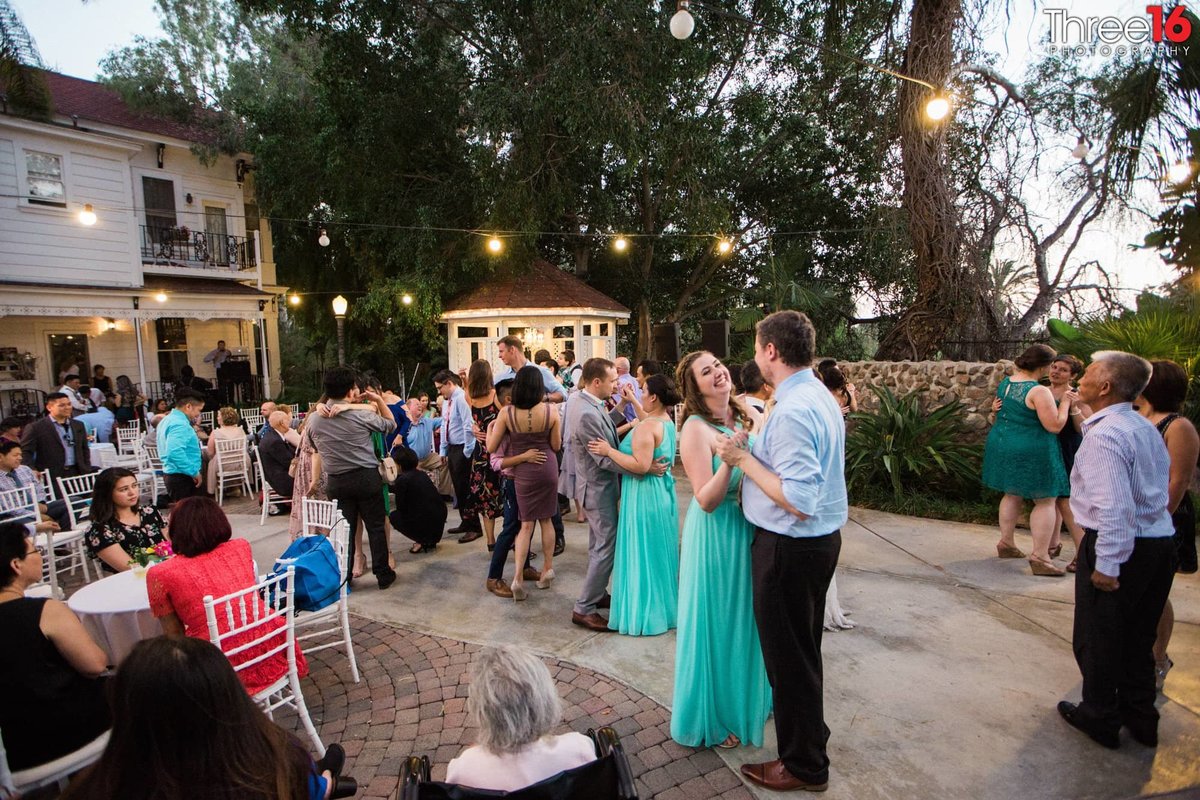 Guests dance at a Jones Victorian Wedding Venue Wedding Reception