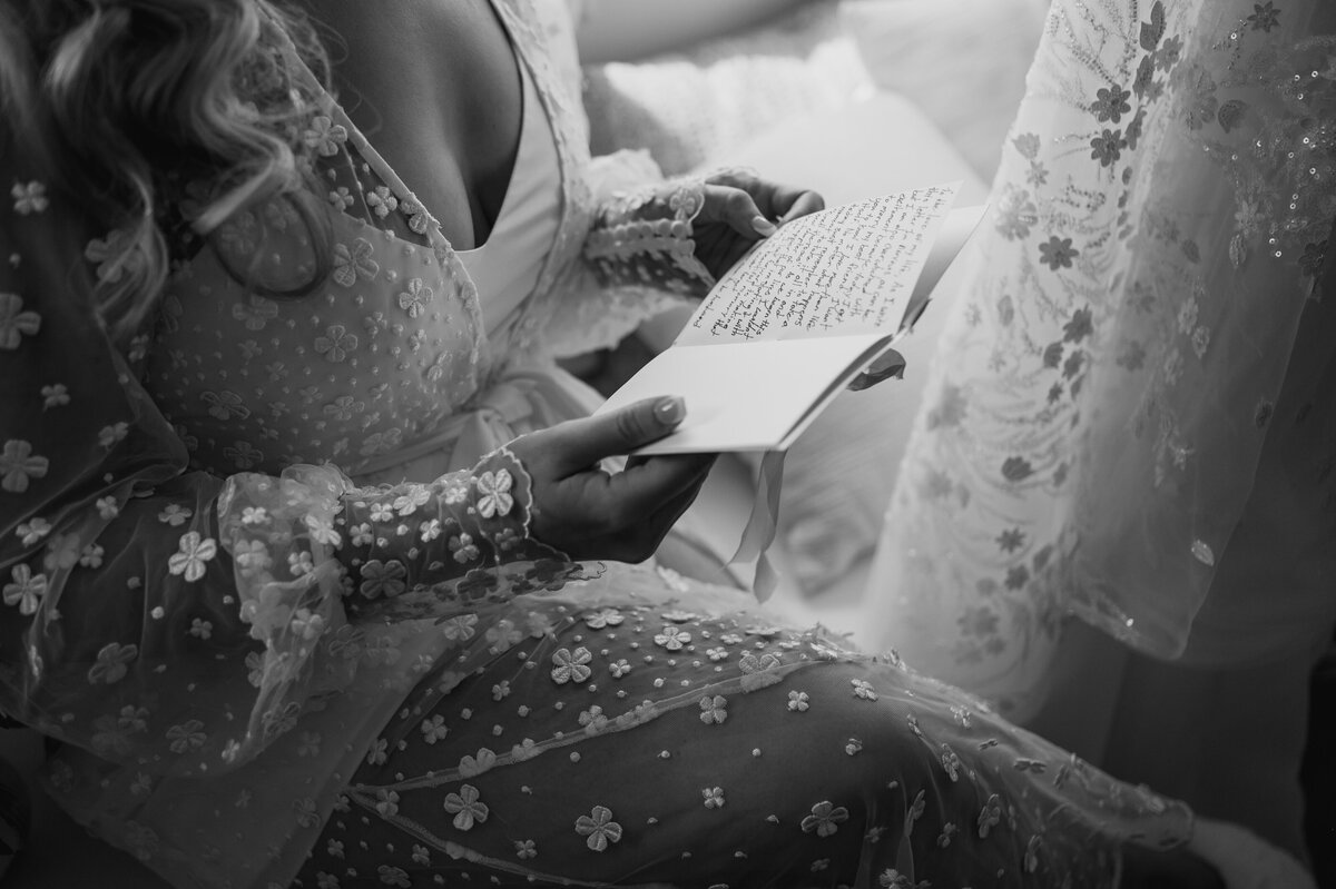 bride reading vows on her wedding day