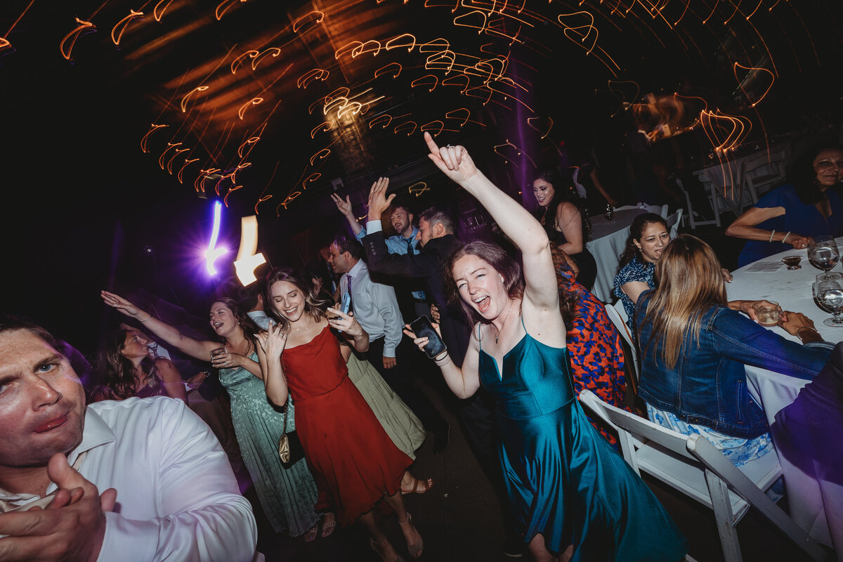 ct-wedding-dance-floor-bride-guests-hands-up