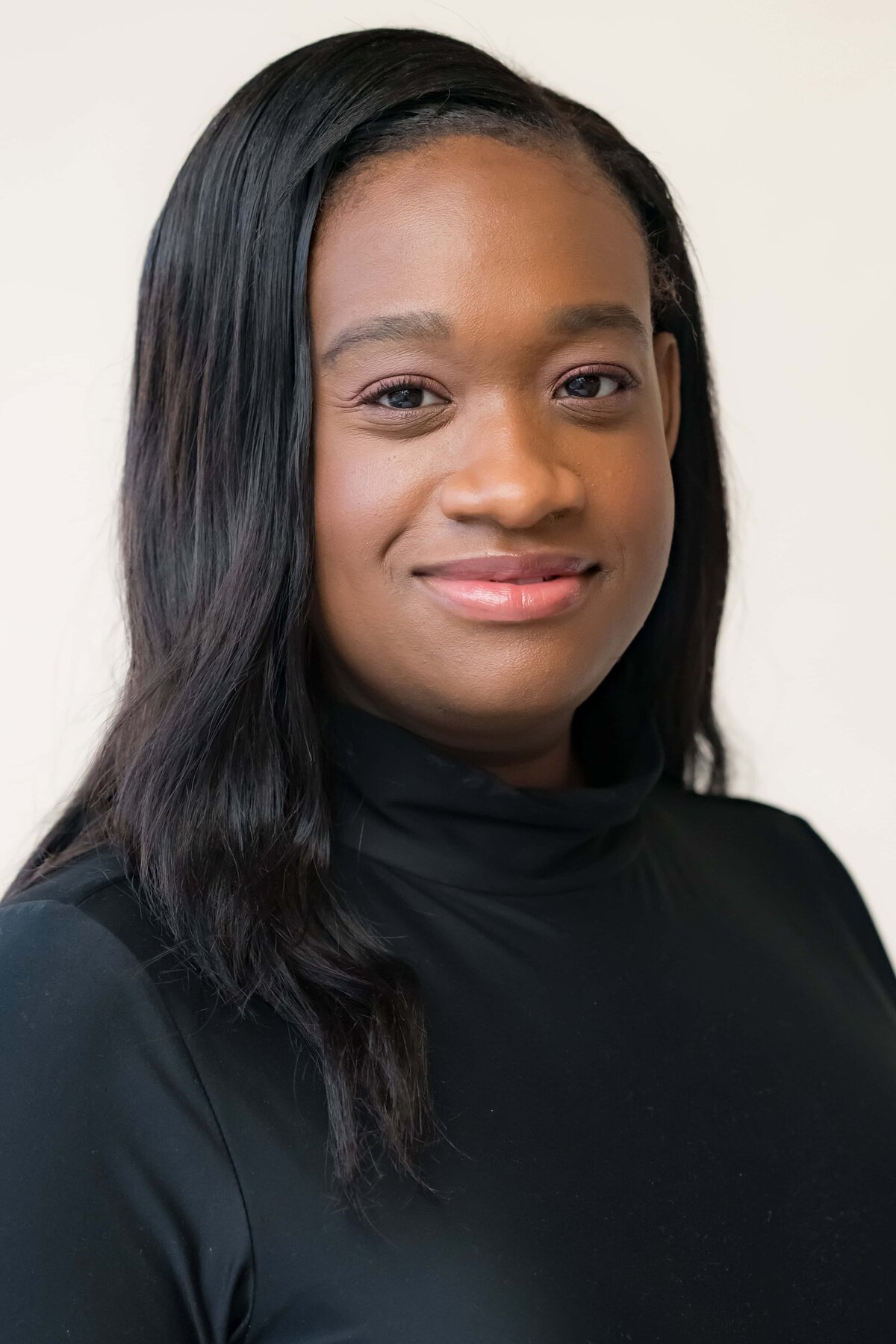 Beautiful African American woman smiling with long dark hair