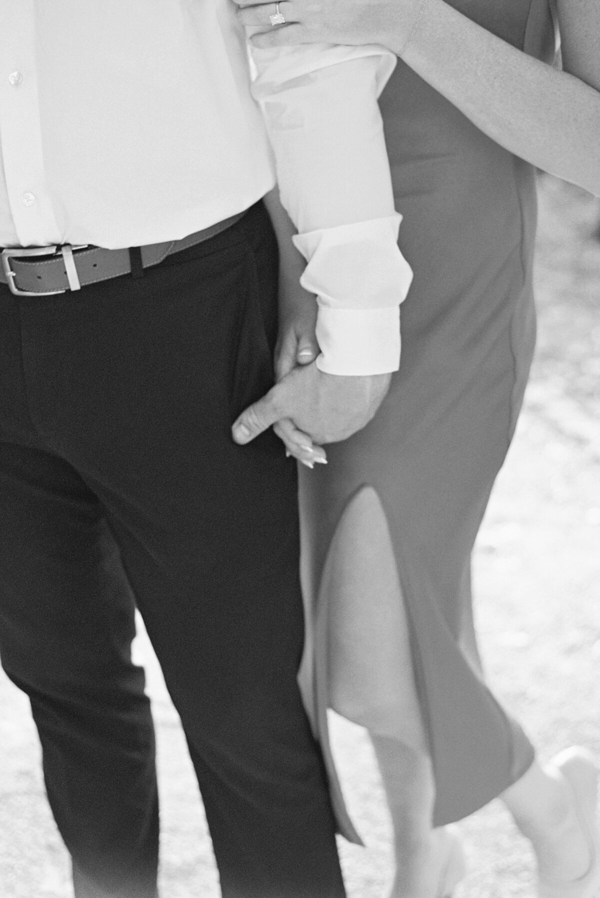 Black and white close-up of engaged couple holding hands in Columbus, Ohio.
