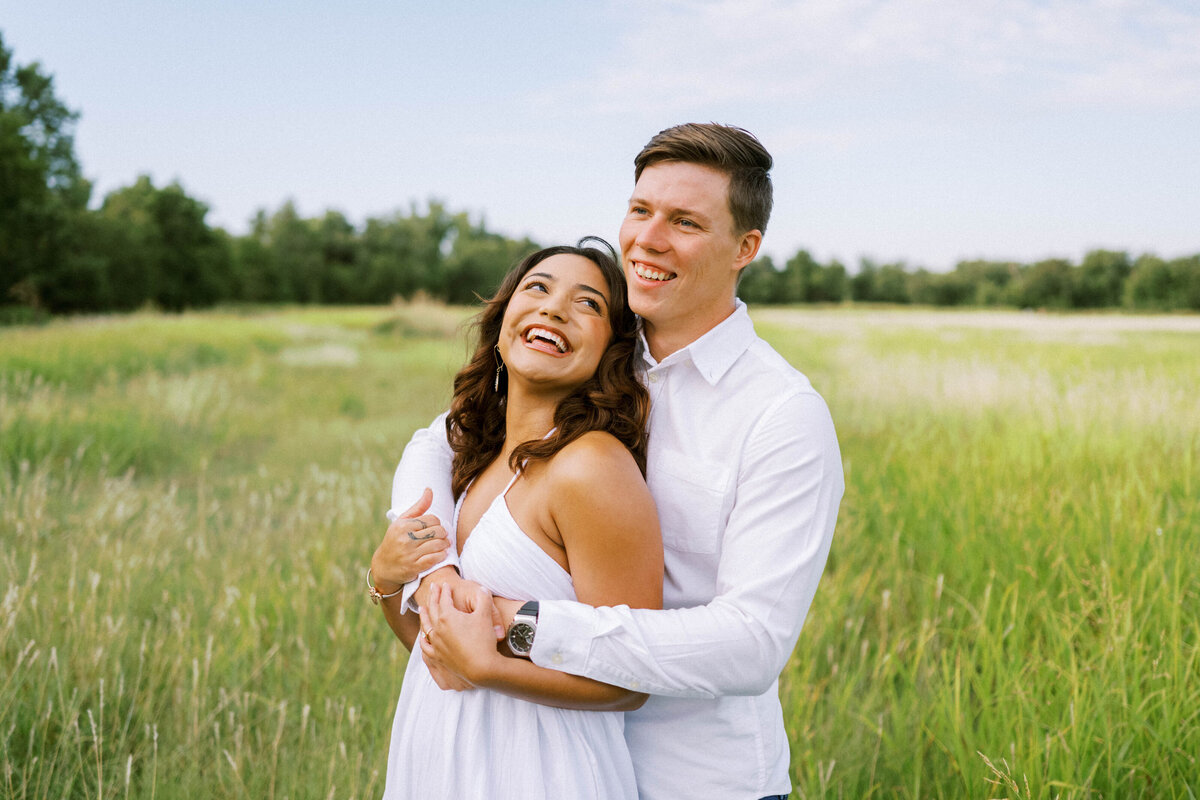 engaged-couple-in-a-field
