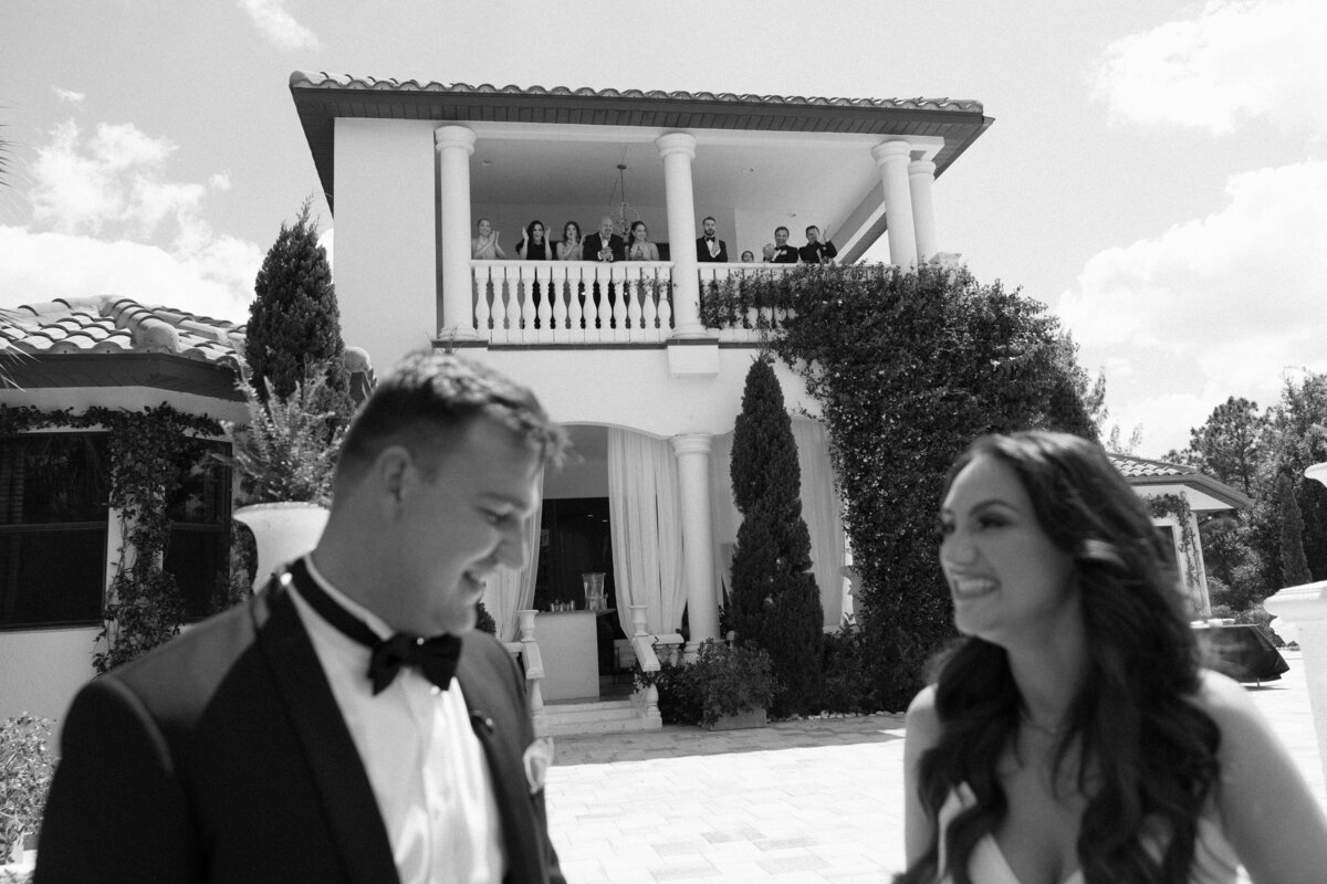 Emotional first look moment between bride and groom at La Casa Toscana