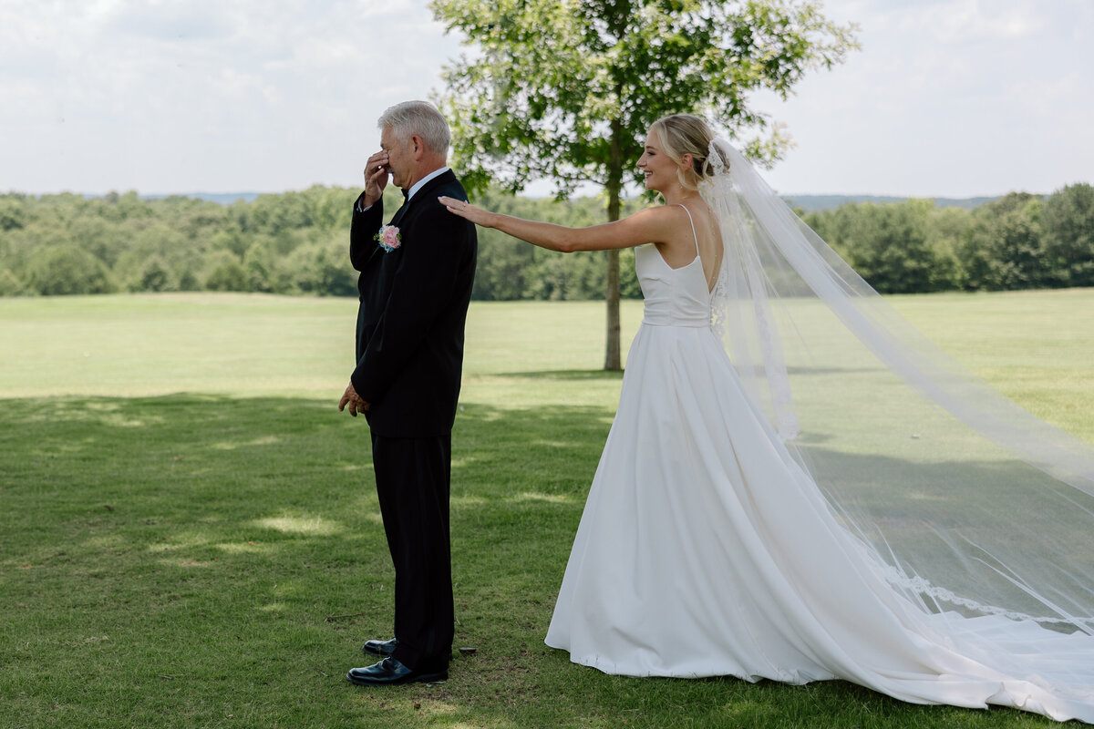 Bride and father of the bride first look; father crying