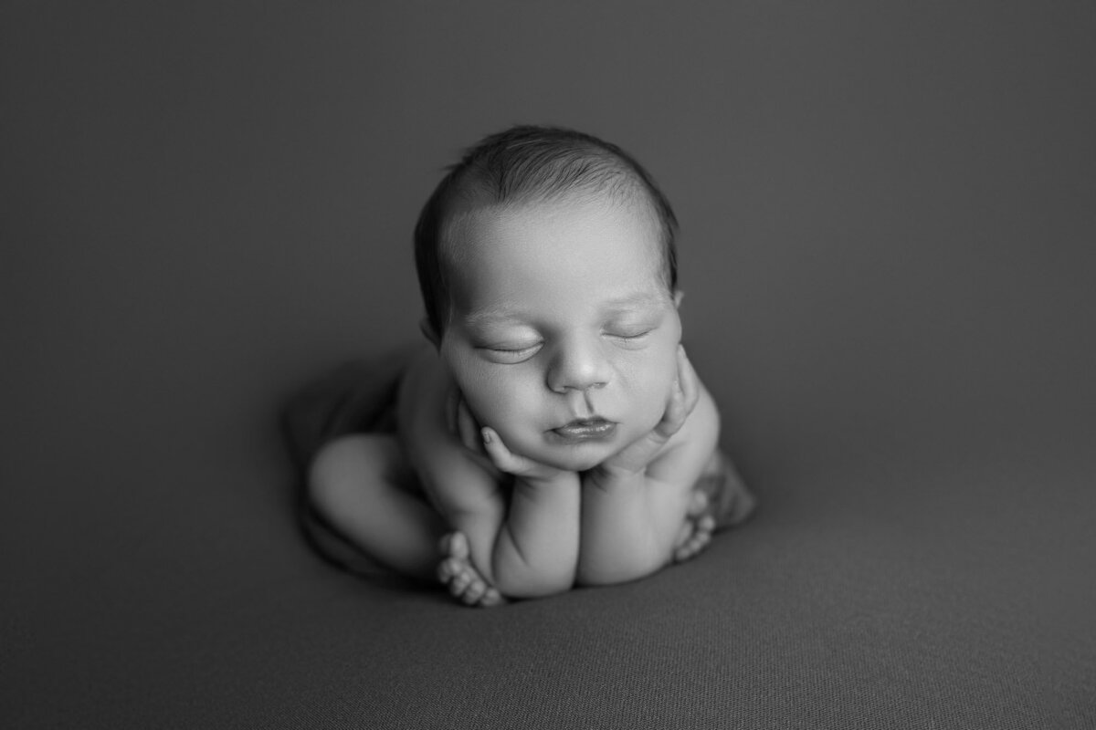 Black white newborn classic froggy pose Round Rock artistic photographer