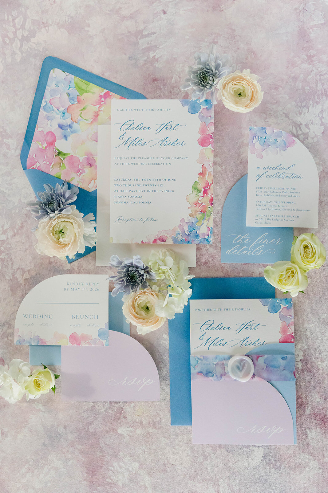 complete-watercolor-wedding-suite-flatlay-with-flowers