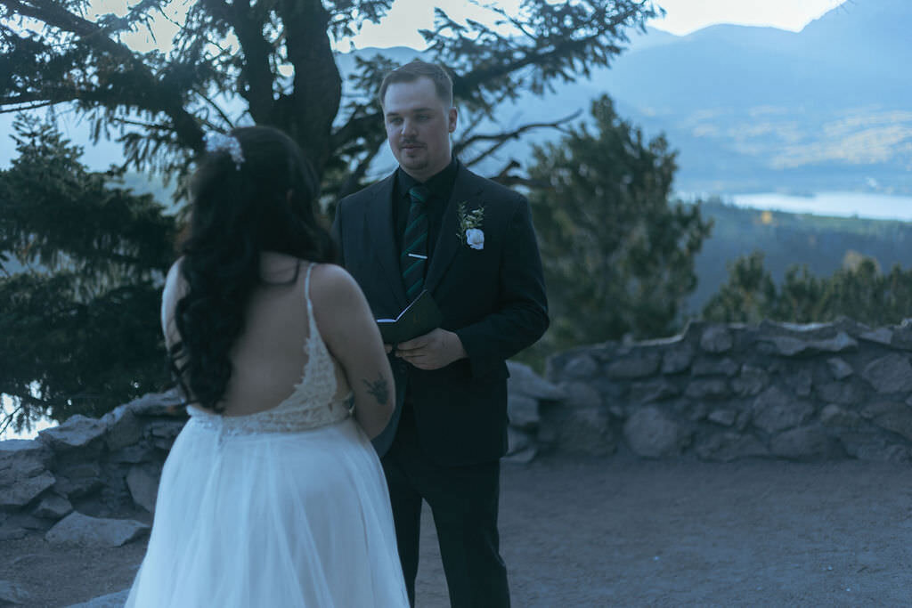 A person saying their vows during their wedding.