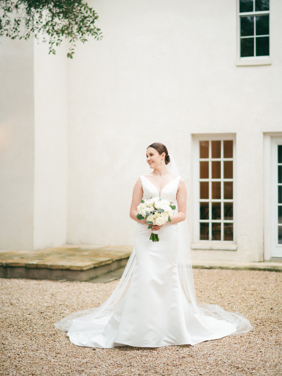 bride in white modern dress on wedding day