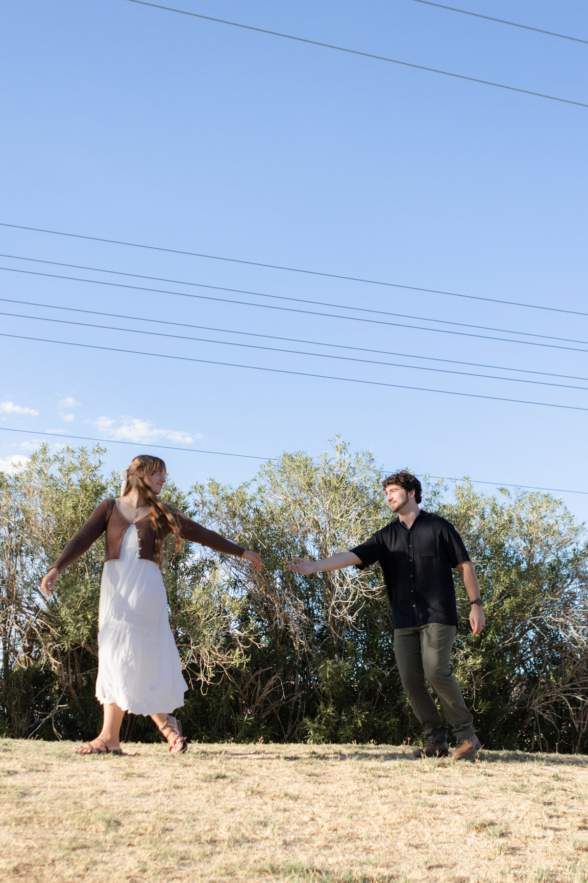 Jovanna G Photography. Classic, sophisticated Wedding Photos. Soft romantic engagement photos. Soft romantic WeddingPhotos. Sophisticated Wedding Photographer. Professional Wedding Photographer. Destination Wedding Photographer. Luxury Wedding photographer. Traveling Wedding Photographer. AZ Wedding Photographer. Gilbert AZ Wedding Photographer. Queen Creek Wedding Photographer. Phoenix Wedding Photographer. Scottsdale Wedding Photographer. Flagstaff Wedding Photographer. SoCal Wedding Photographer. California Wedding Photographer. Northern California Wedding Photographer. Southern California Wedding Photographer. San Francisco Wedding Photographer. Bay Area Wedding Photographer. San Jose Wedding Photographer. Golden Gate Bridge Wedding Photographer. Beach Lover Wedding Photographer. Palace of the Fine Arts Wedding Photographer. Ocean Lover. I love California. Orange County Wedding Photographer. Newport Beach Couples Photographer. Newport Beach Wedding Photographer. Laguna Beach Couples Beach Engagement Photographer. Laguna Beach wedding beach photographer. Los Angeles Wedding Photographer. Young and in love engaged couples who live in southern California. Christian Young Couple. Young Engaged Couple. Engaged High School Christian Couple. Christian Values. Young conservative Christian women. Young Conservative Christian men. Young Conservative Christian Couple. Young Christian Couple Engaged in High School. Young Christian College Couple. Lakeside Lovers in the Autumn Sun. David & Grace - engagement photos. Jovanna G Photographer Engagement Photos. Arizona sun shining through autumn trees- engagement. Chandler, AZ Engagement Photos. Chandler, AZ 2026 bride. Chandler, AZ Wedding Photographer. Chandler, AZ Young Engaged Couple. Girl in her 20s. Engaged Arizona Girl in her 20s. Lakeside Engagement photos. AZ Lakeside Engagement Photos. AZ Weeping Willow Lakeside Proposal. Arizona Lakeside Proposal with weeping willow tree. Detail shot of engagement ring on Arizona Lakeside estate. Chandler, AZ Lakeside Estate Proposal Outfit Inspiration.