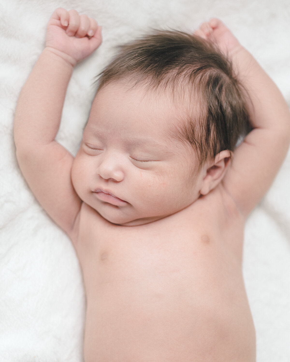 San Francisco newborn photographer capturing natural baby moments — peaceful newborn photo
