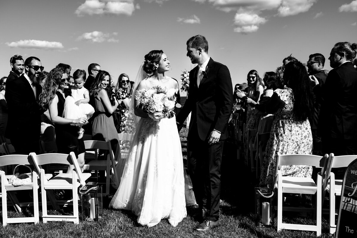 The newlyweds at the top of the aisle at the Stageneck Inn York Maine wedding